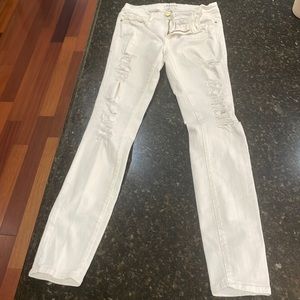 Frame white denim ripped skinny jeans, size 27